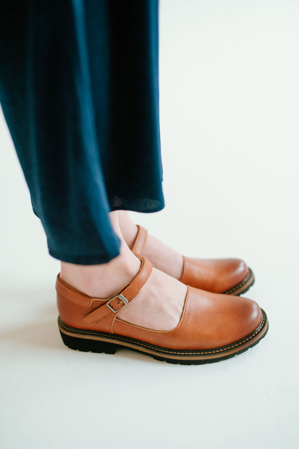 brown closed toe sandal style shoe