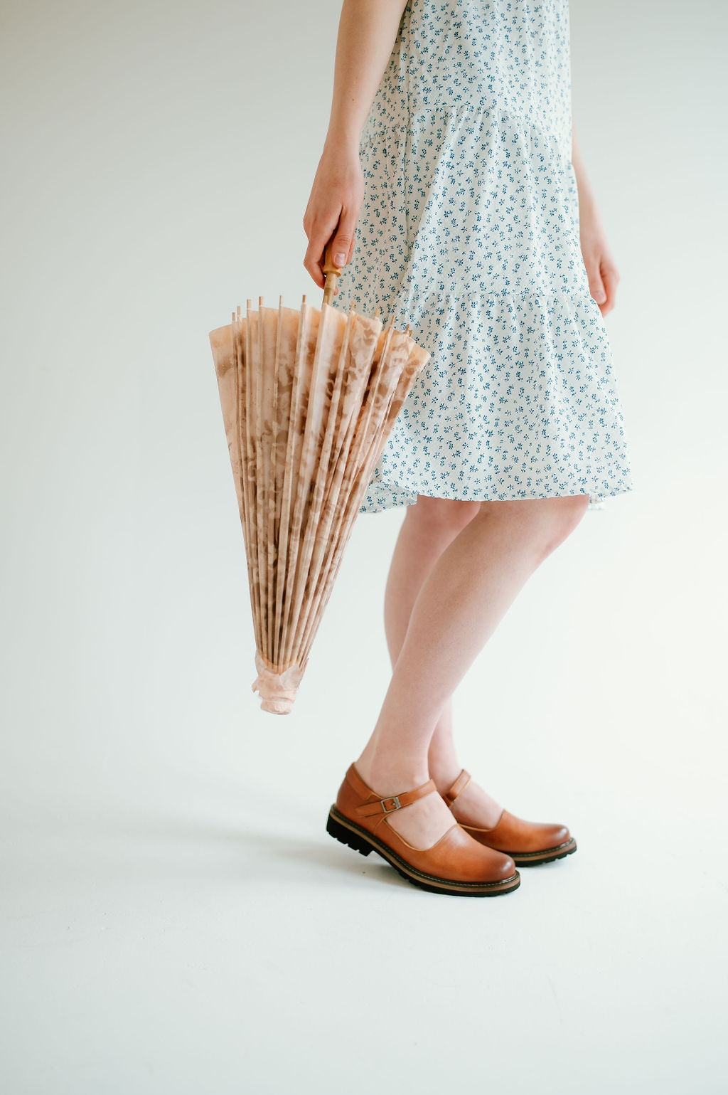 brown closed toe sandal style shoe