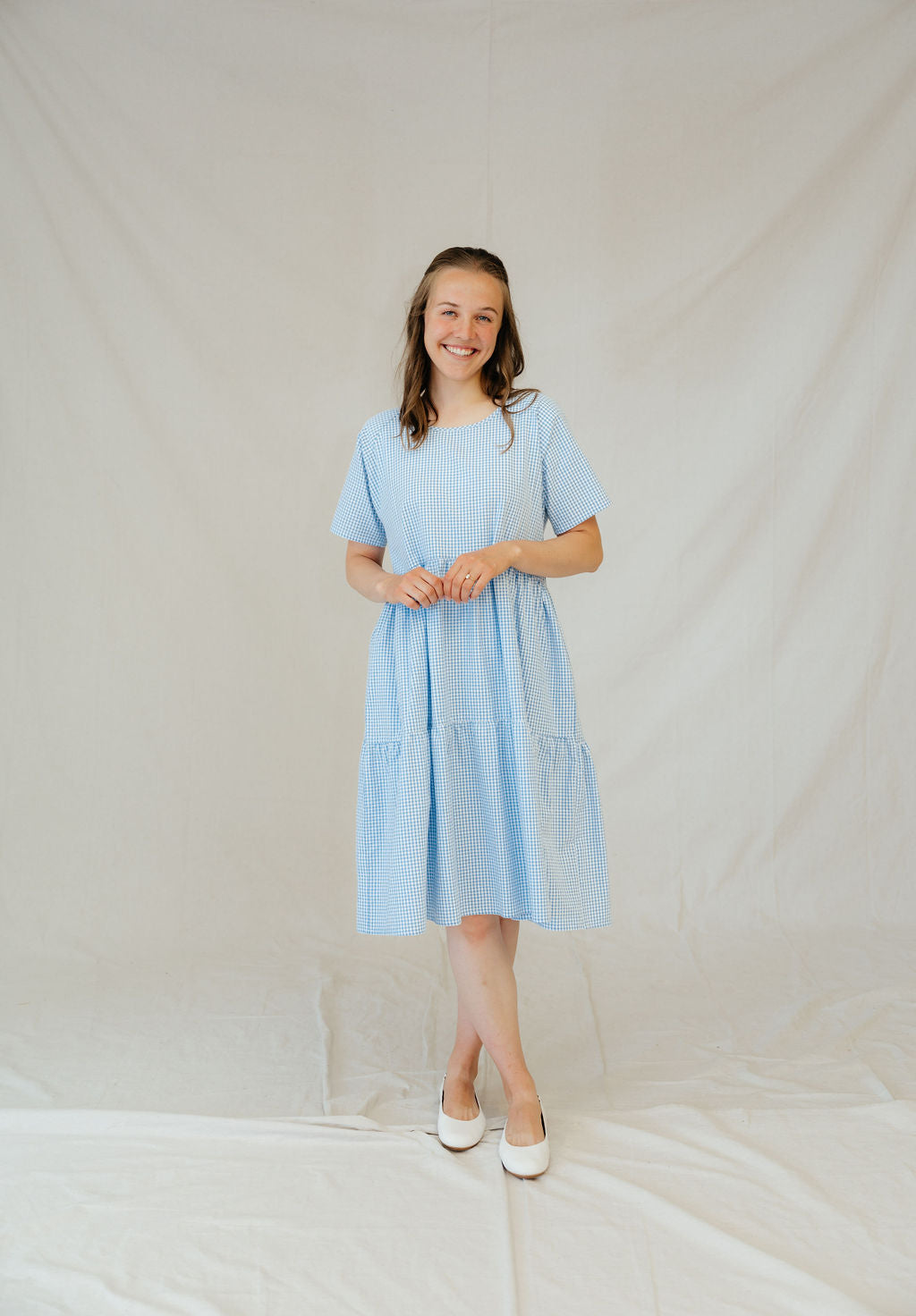 This dress features a tiered skirt, flowy sleeves, and pockets! 