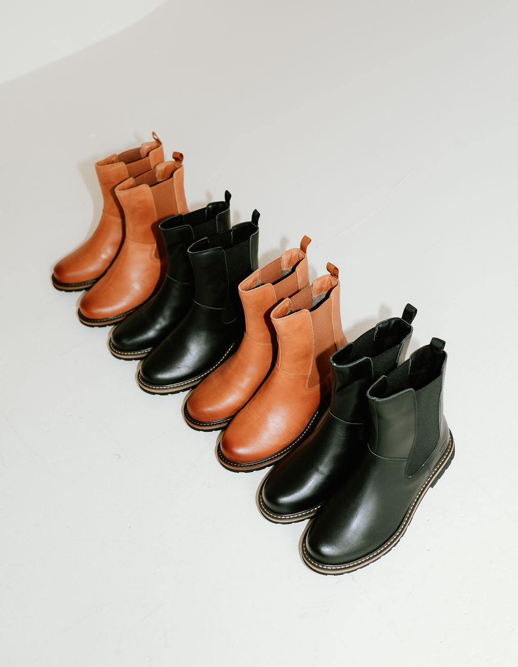 tan and black chelsea style boots