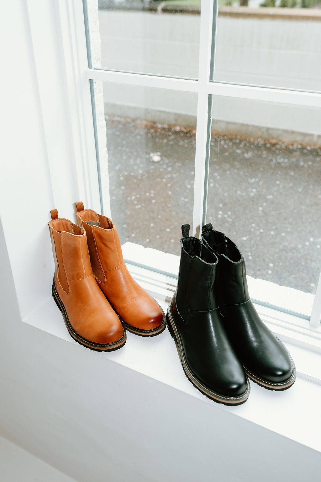 tan and black chelsea style boots