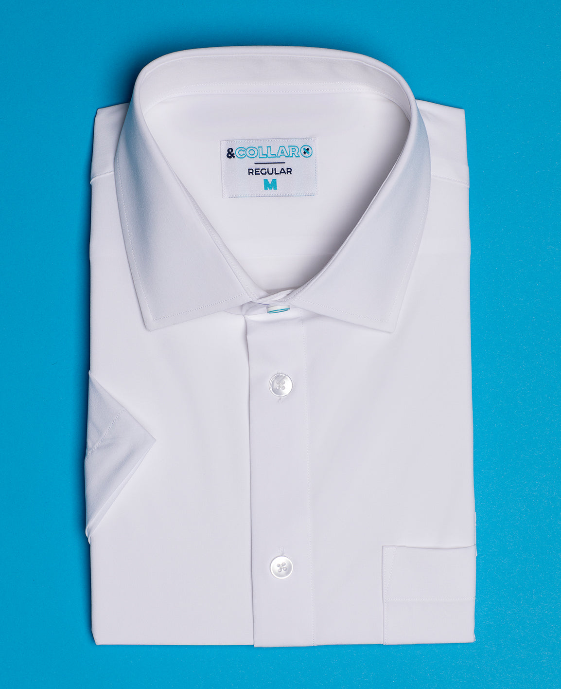 white short sleeve dress shirt folded