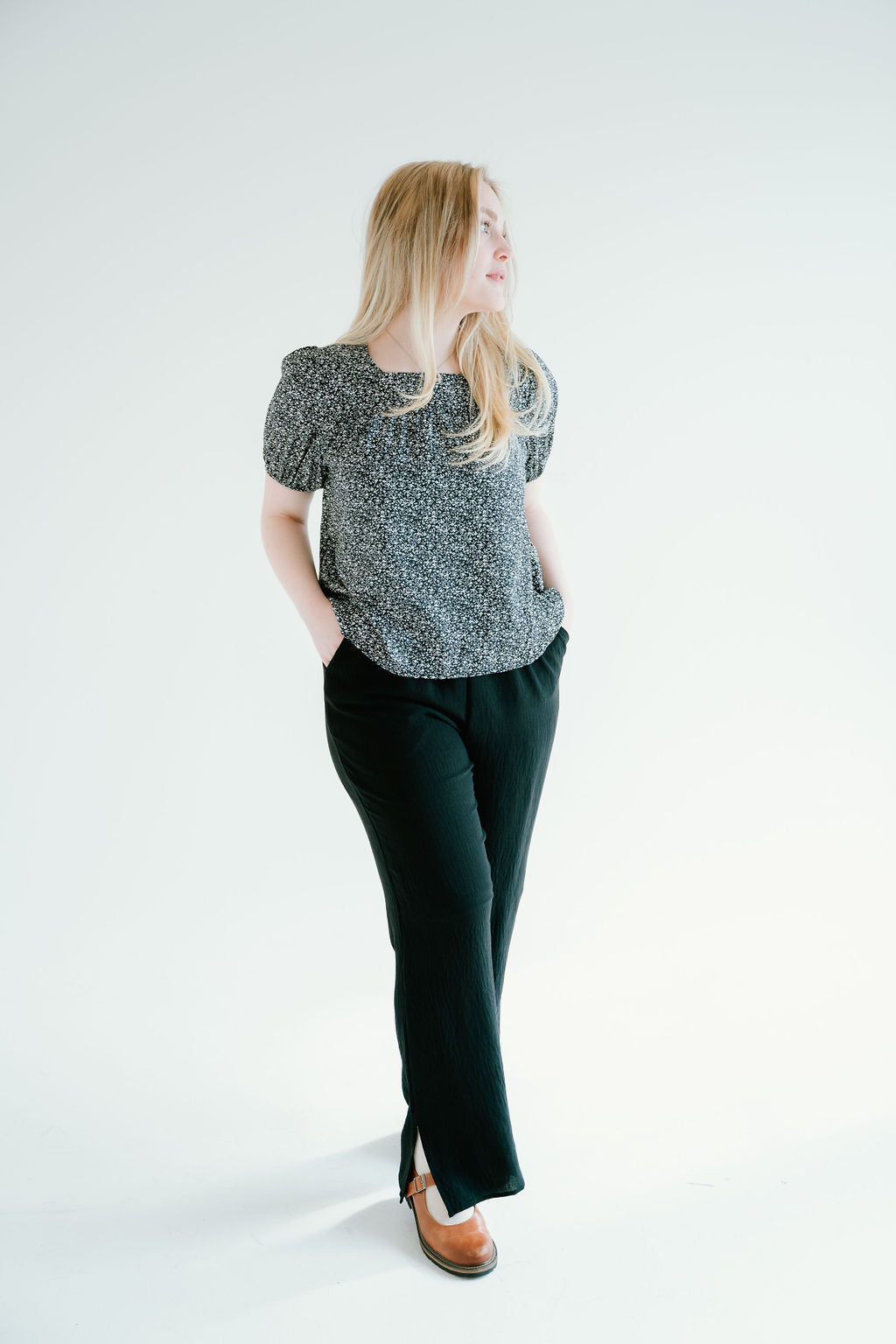 floral top with a soft square neckline, puff sleeves and flowy bodice