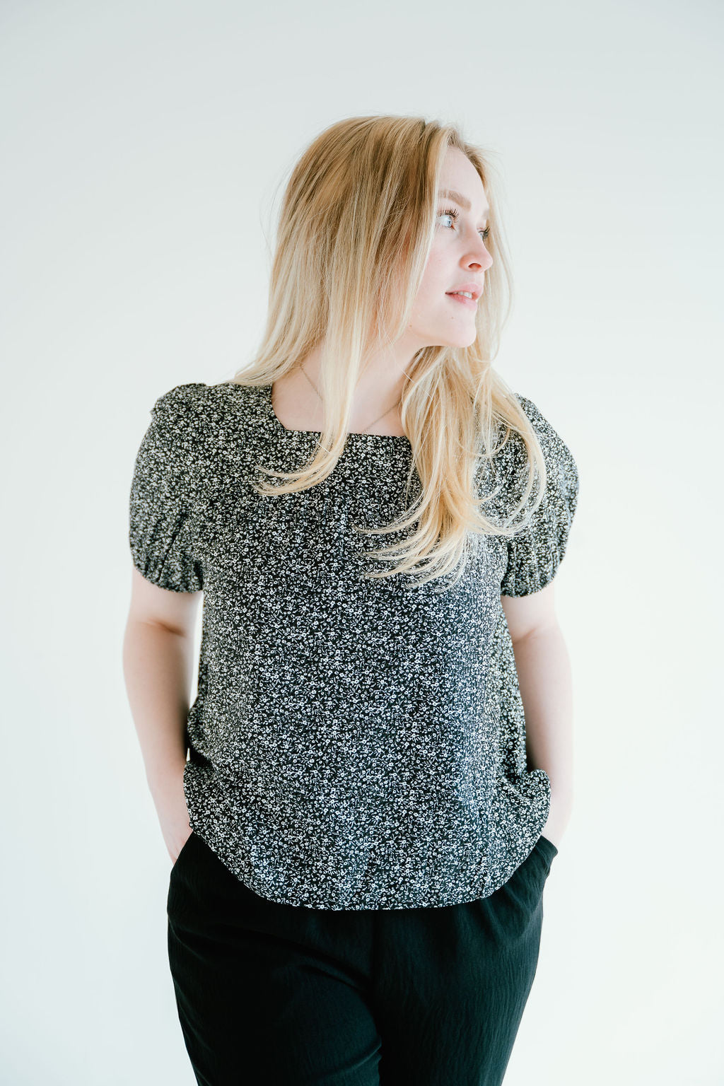 floral top with a soft square neckline, puff sleeves and flowy bodice