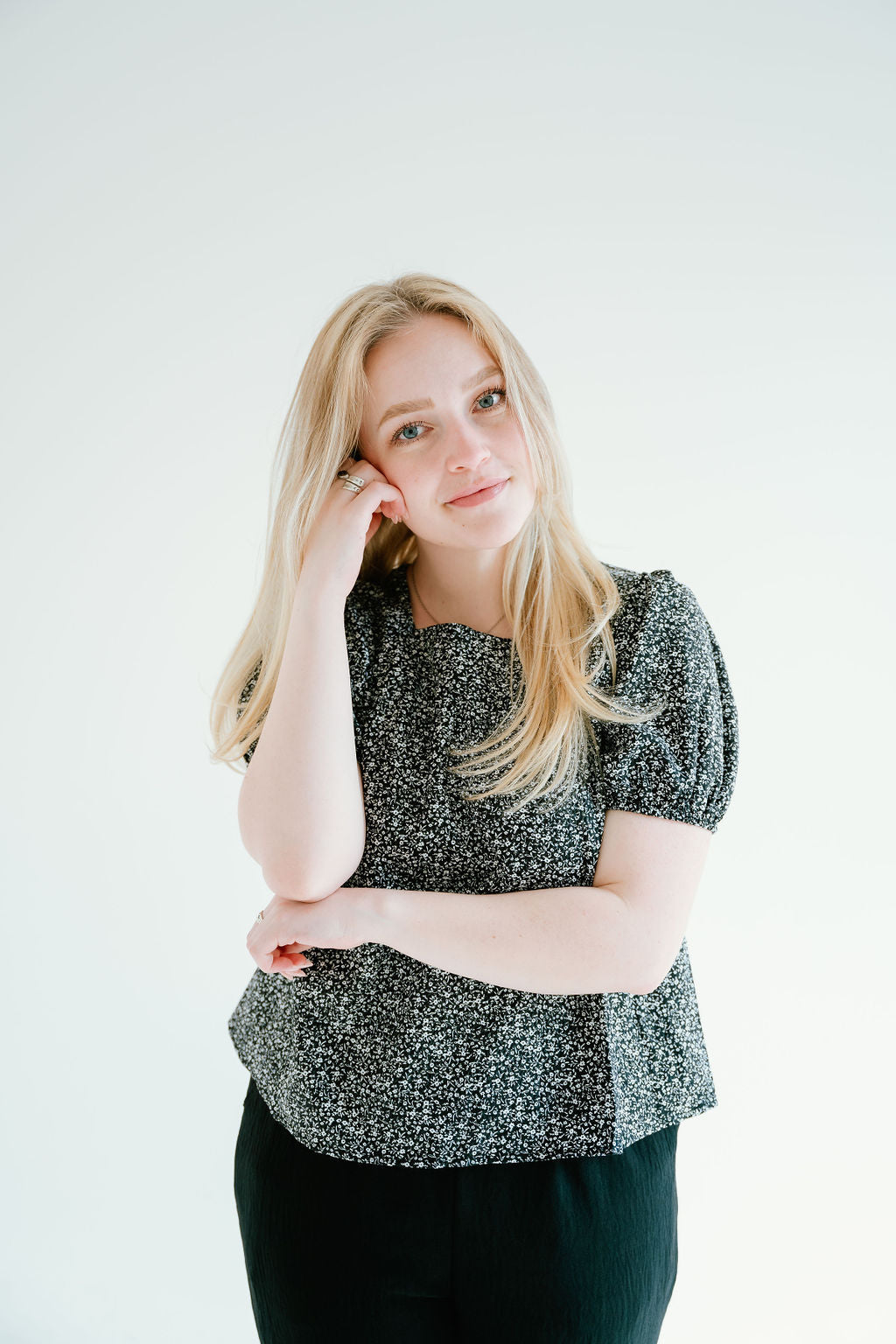 floral top with a soft square neckline, puff sleeves and flowy bodice