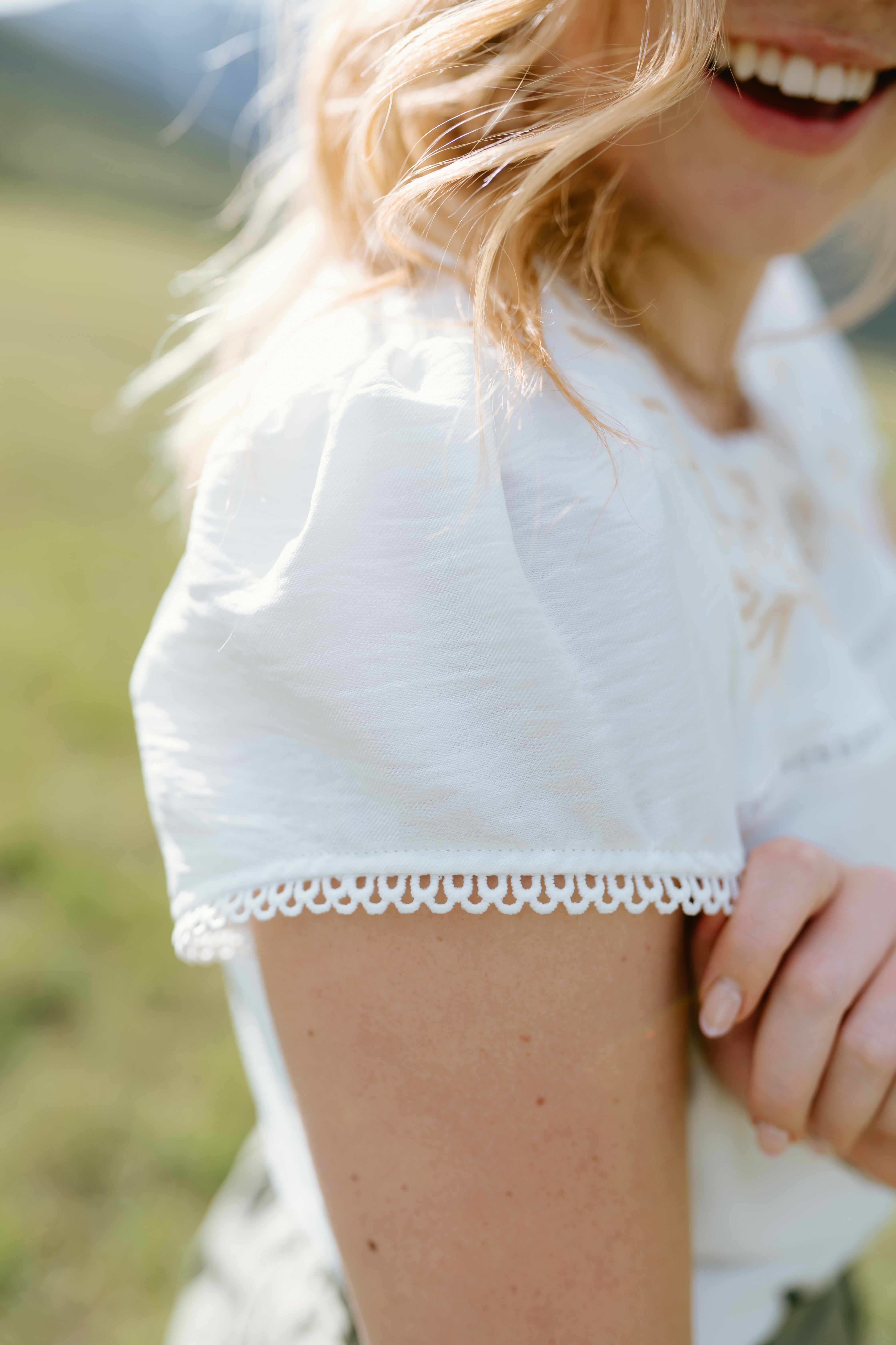 Bright white Hampton Top with lace trim, perfect for a casual, stylish look at Bloomingdale's.