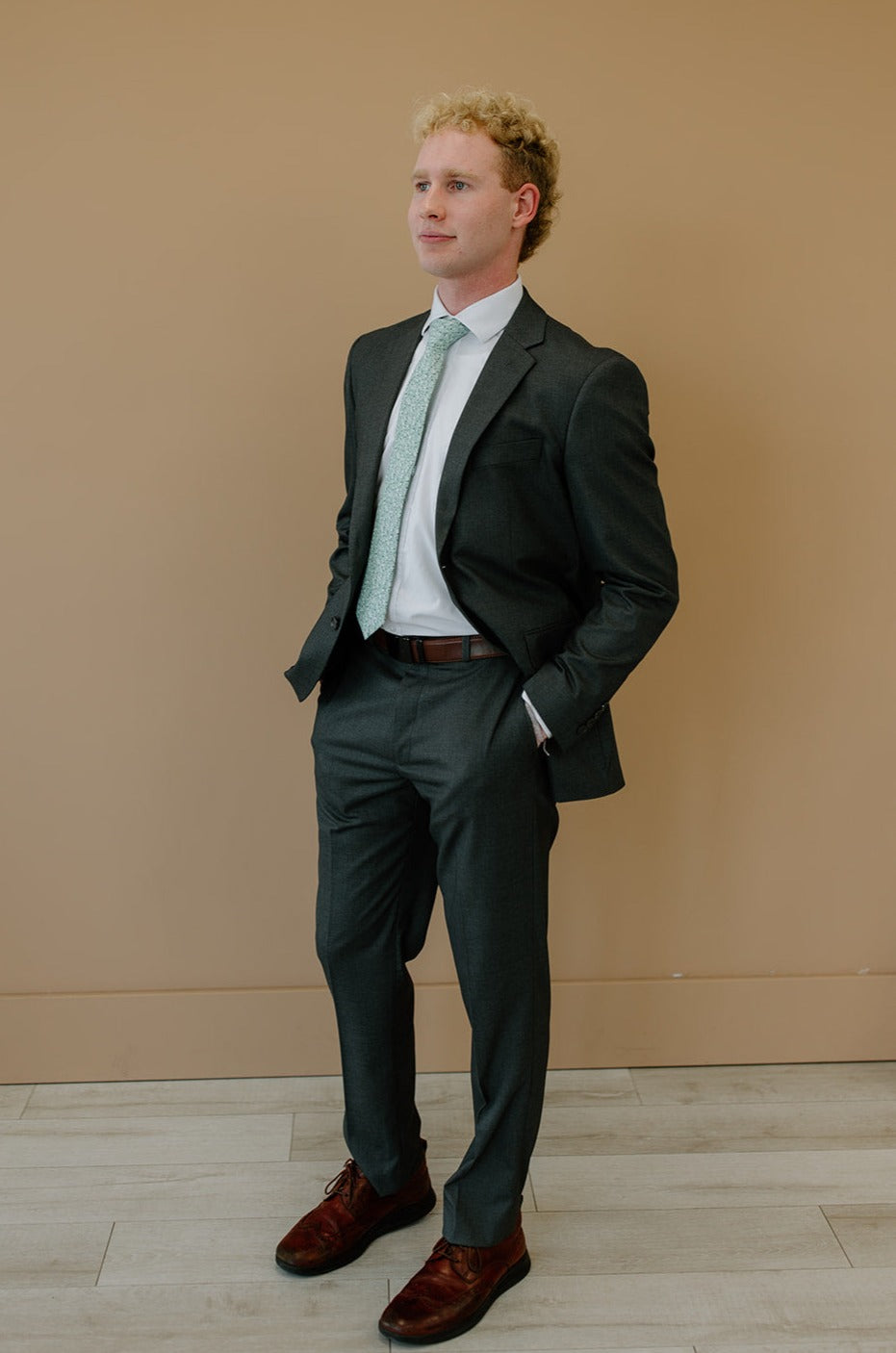 Man wearing charcoal suit