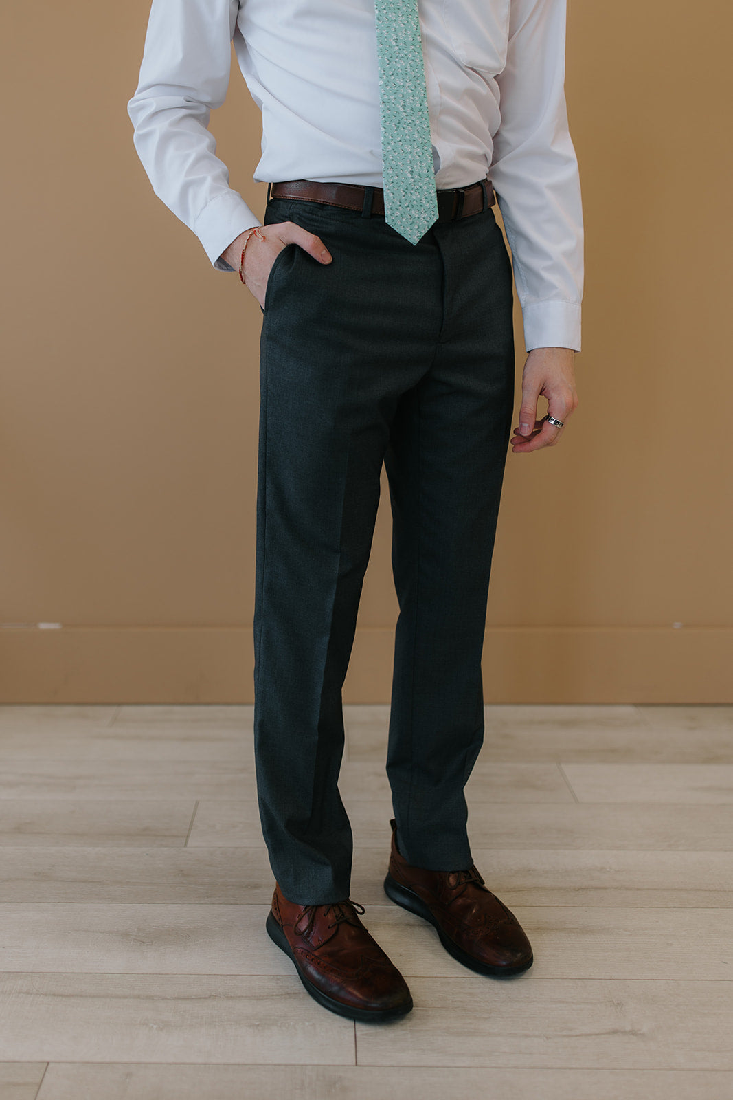 Man wearing charcoal suit