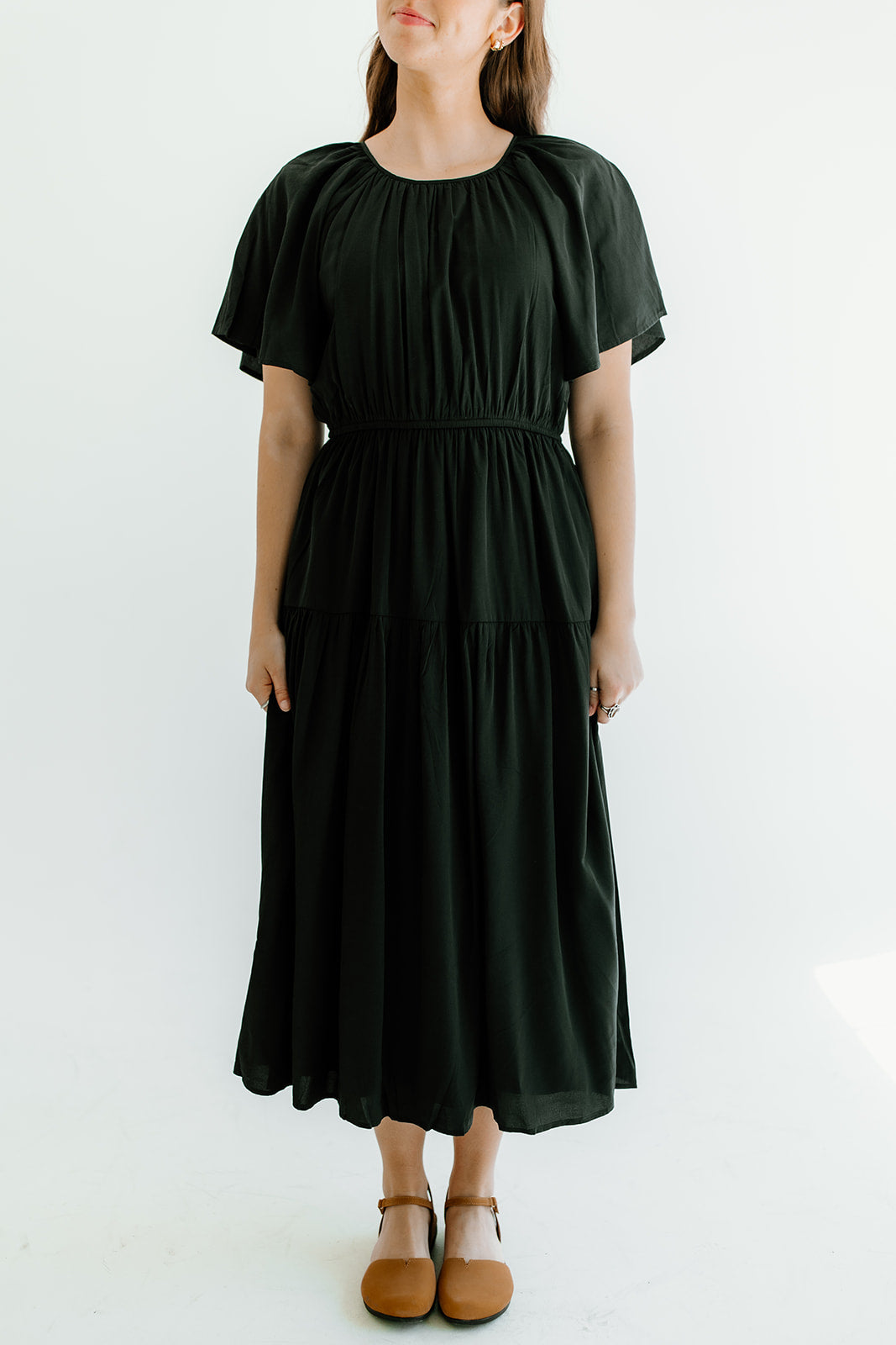 woman wearing a black dress